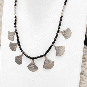 Beautiful necklace authentic jewelry on silver and black glass beads