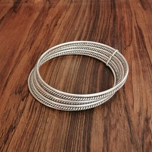 Enhance Your Style with the Set of 7 Handmade Sterling Silver Bangle Bracelets
