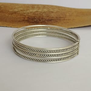 Enhance Your Style with the Set of 7 Handmade Sterling Silver Bangle Bracelets