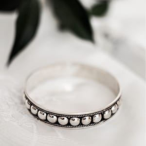 Silver Studded Bracelet: Edgy Elegance for Fearless Style | Order Now!