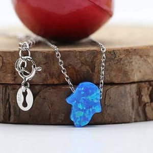 Discover Serenity with our Blue Hamsa Necklace | Buy Now for Spiritual Elegance