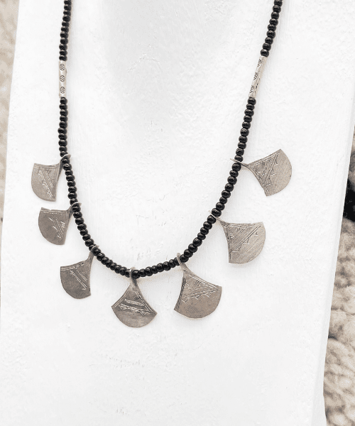 Beautiful necklace authentic jewelry on silver and black glass beads